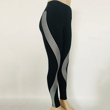 Load image into Gallery viewer, Rainbow Reflective Glow in the Dark Leggings
