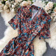 Load image into Gallery viewer, Floral Print Notched Neck Bandage Romper
